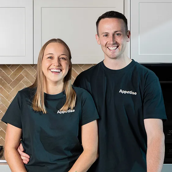 Women and male in kitchen