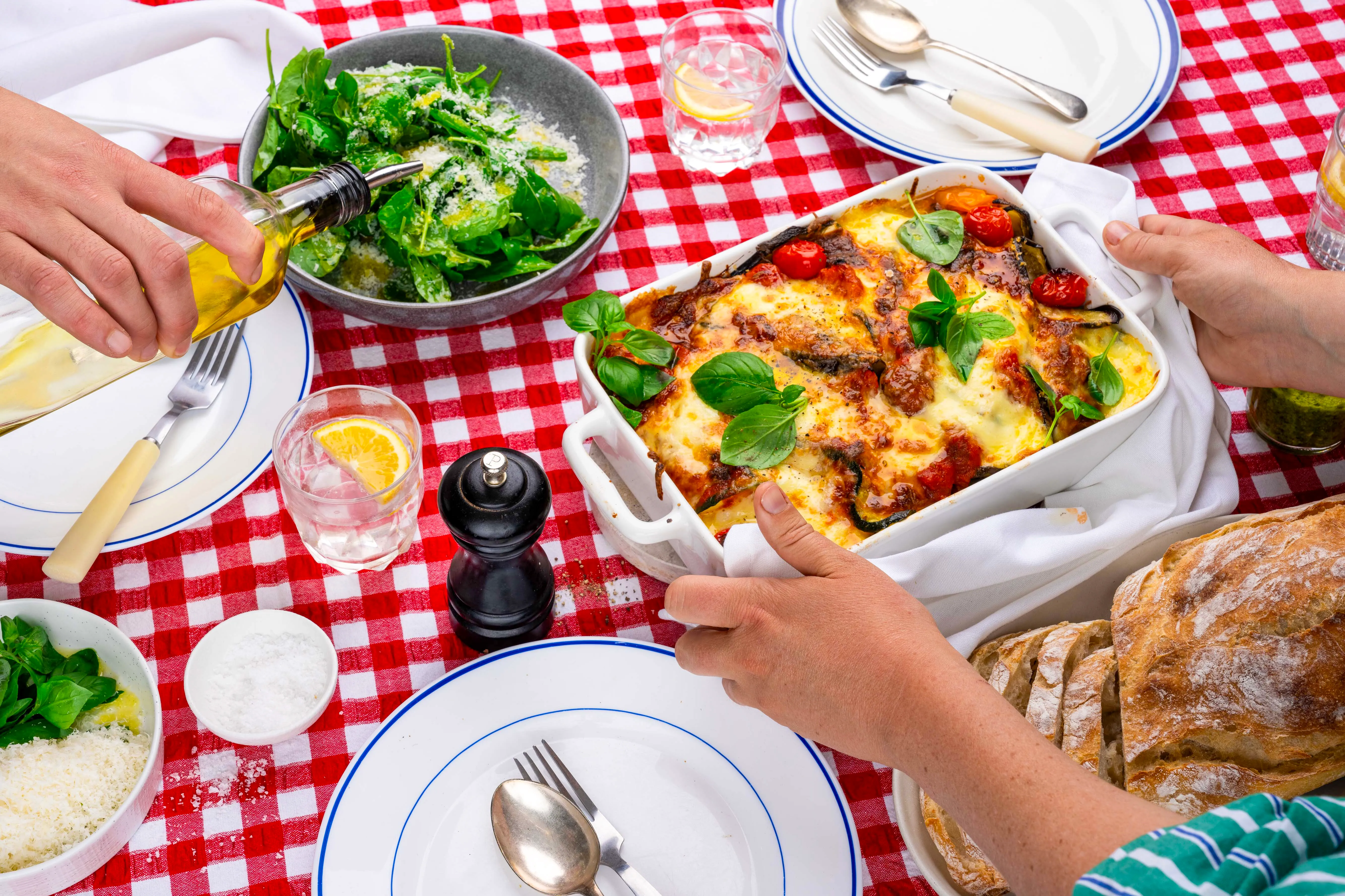 Lasanga dish being served at kitchen table