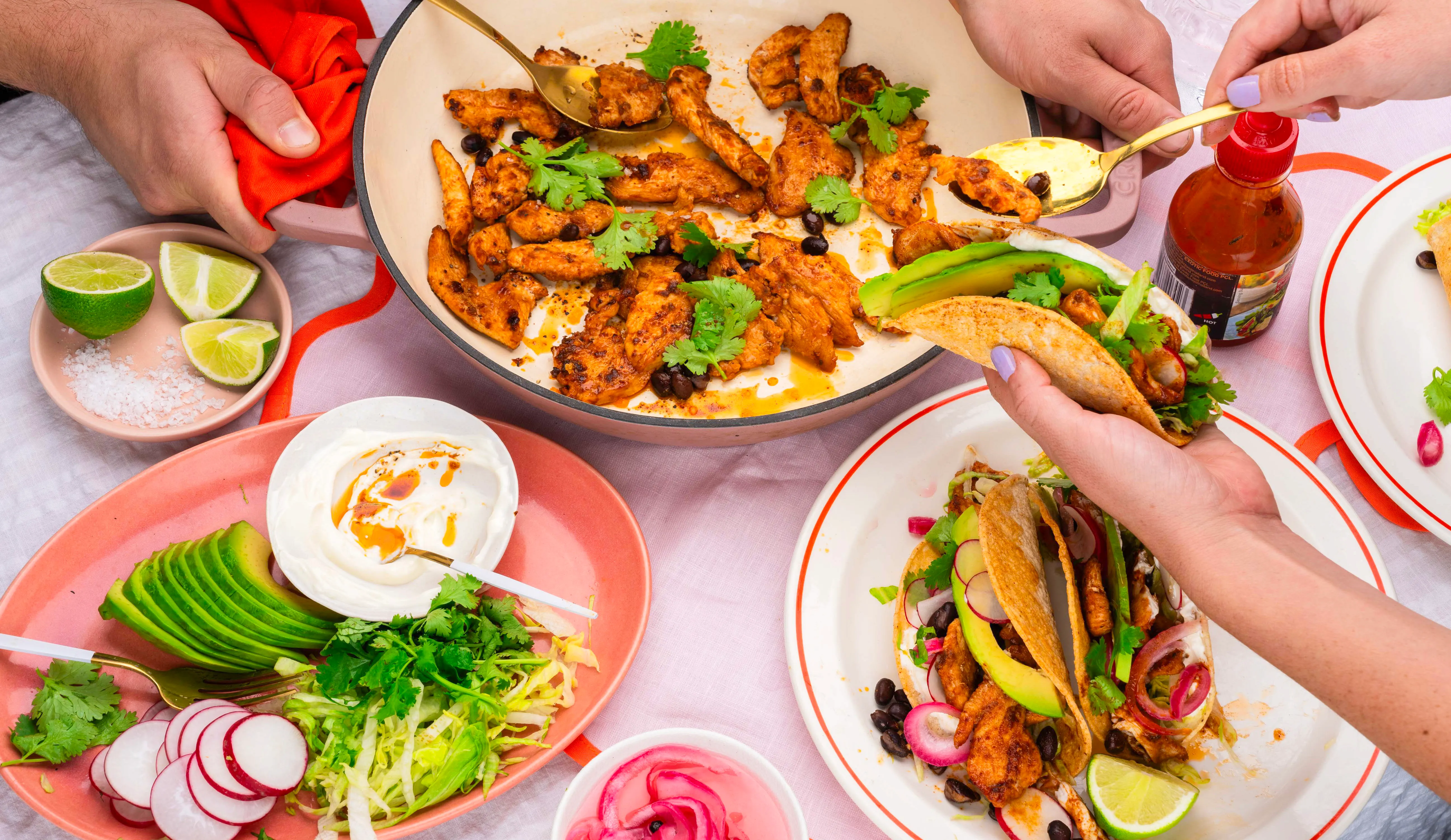 Chicken tacos being served at the dinner table