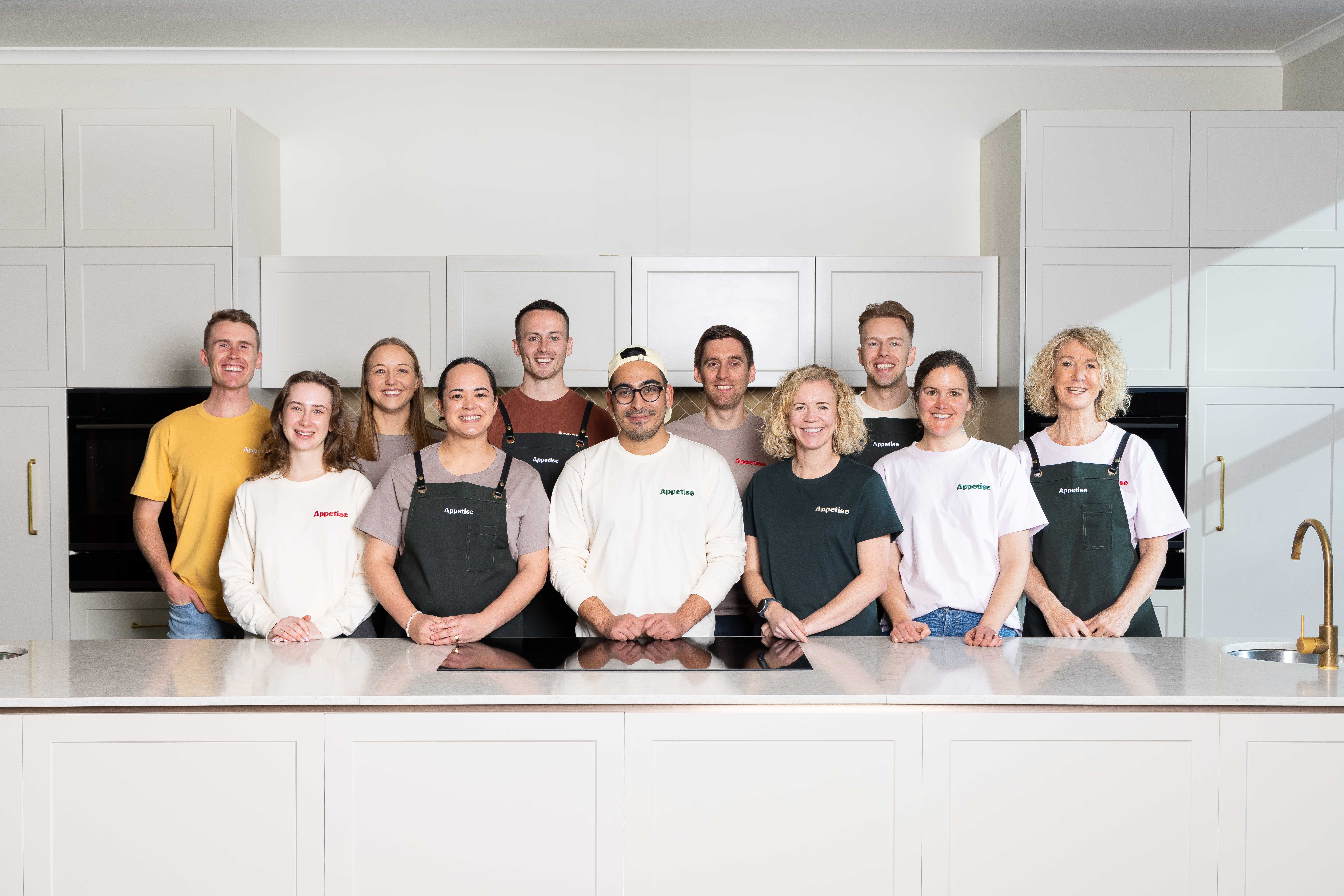 People standing in a kitchen